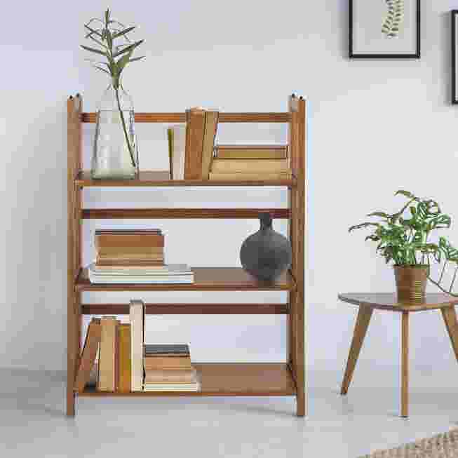 lifestyle shot of the bookcase with books and plants