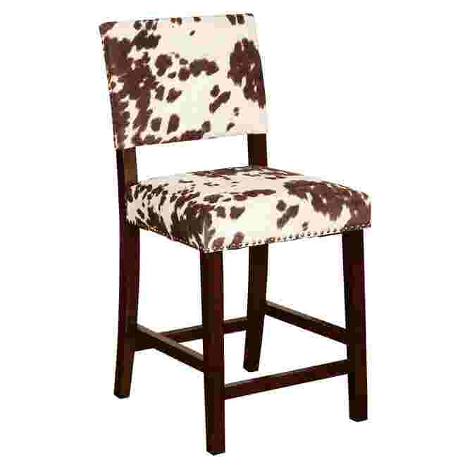 Cowhide patterned counter stool with dark wood frame