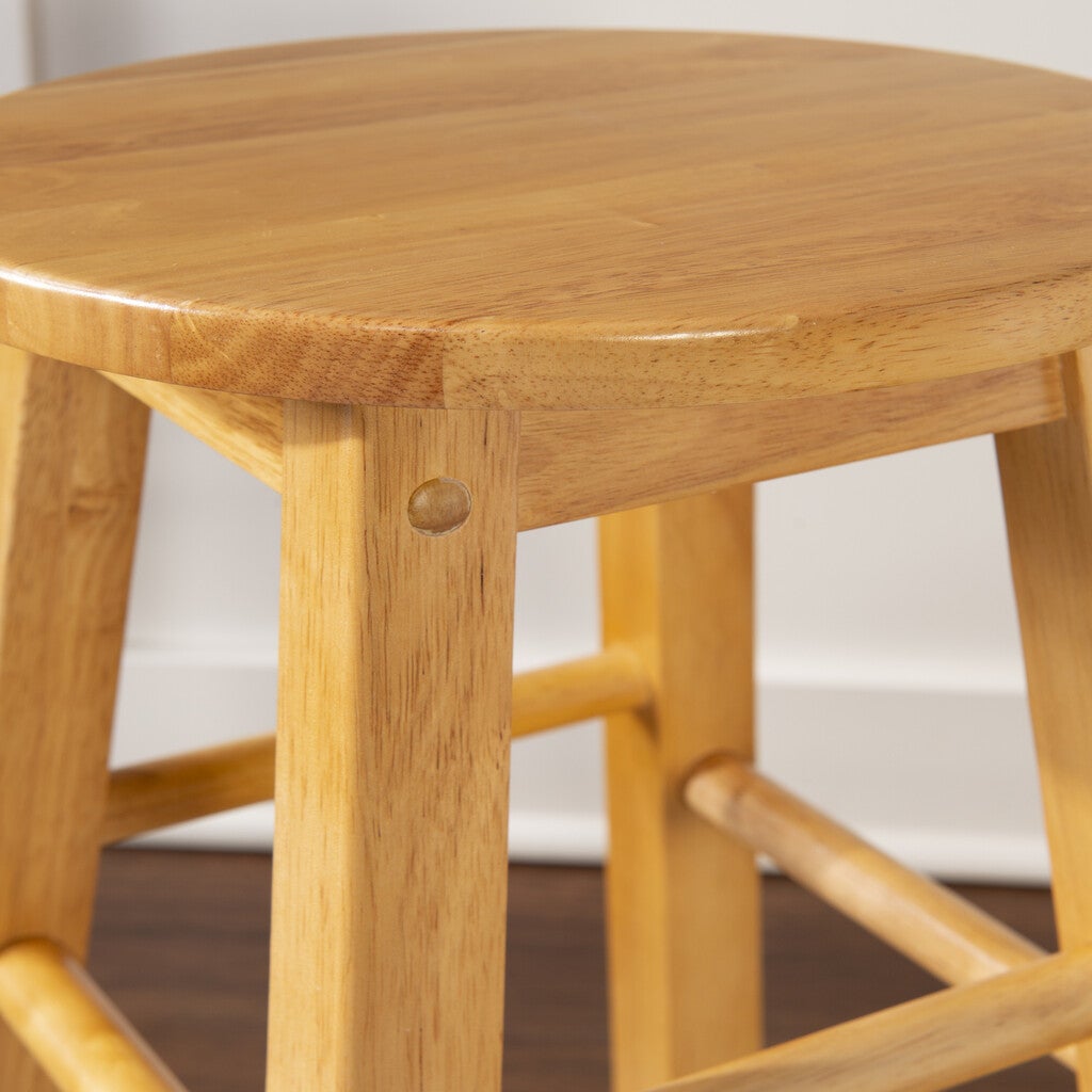 Close-up of wooden stool leg and braces