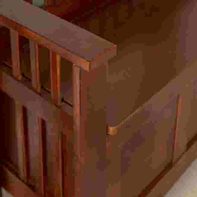 Close-up of wooden storage bench slats and frame