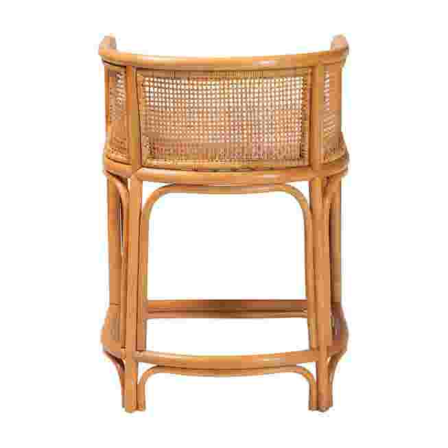 Back view of a natural rattan counter stool with white cushion