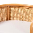 Close-up of the woven rattan back of a counter stool