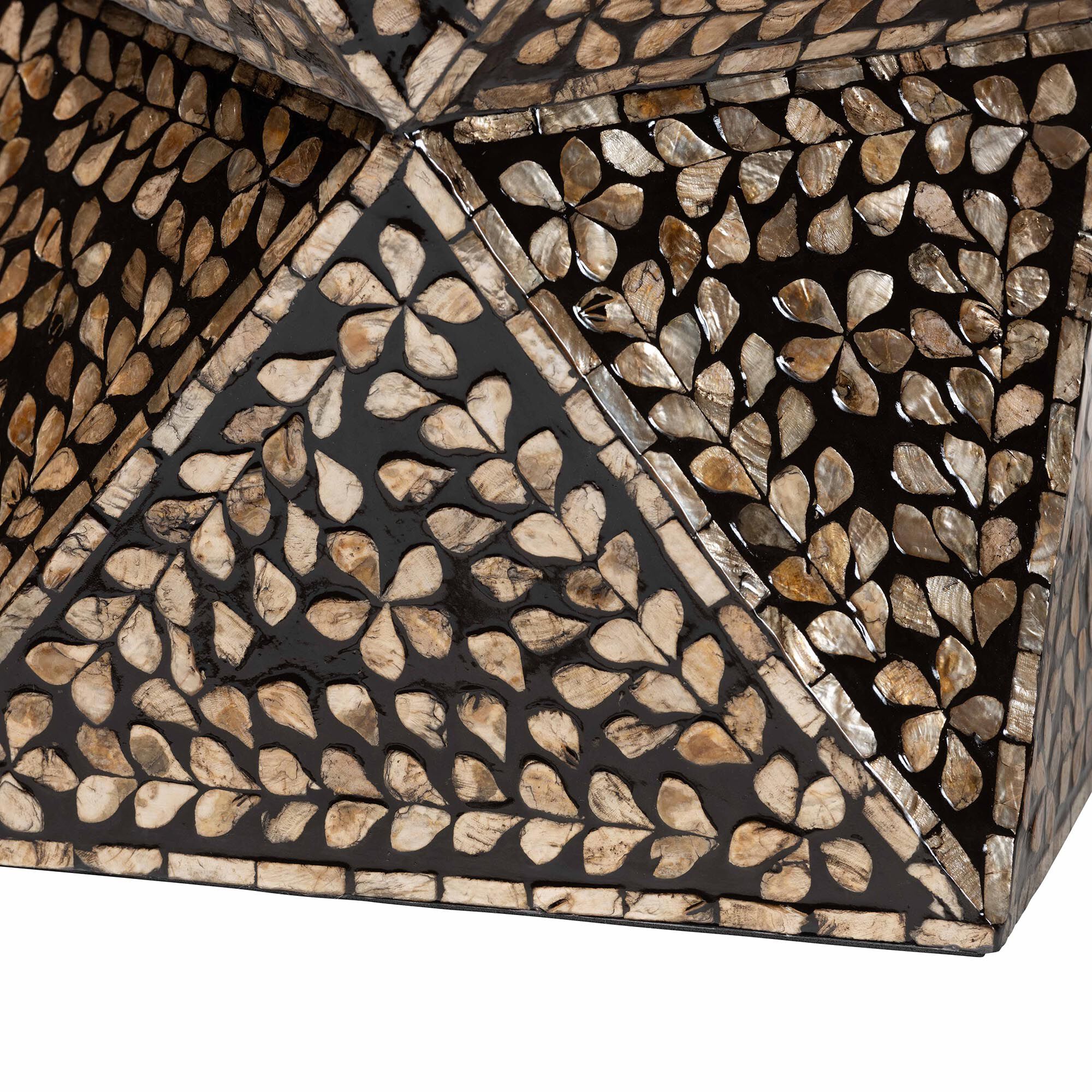 Close-up of the intricate mother of pearl inlay pattern on the end table.