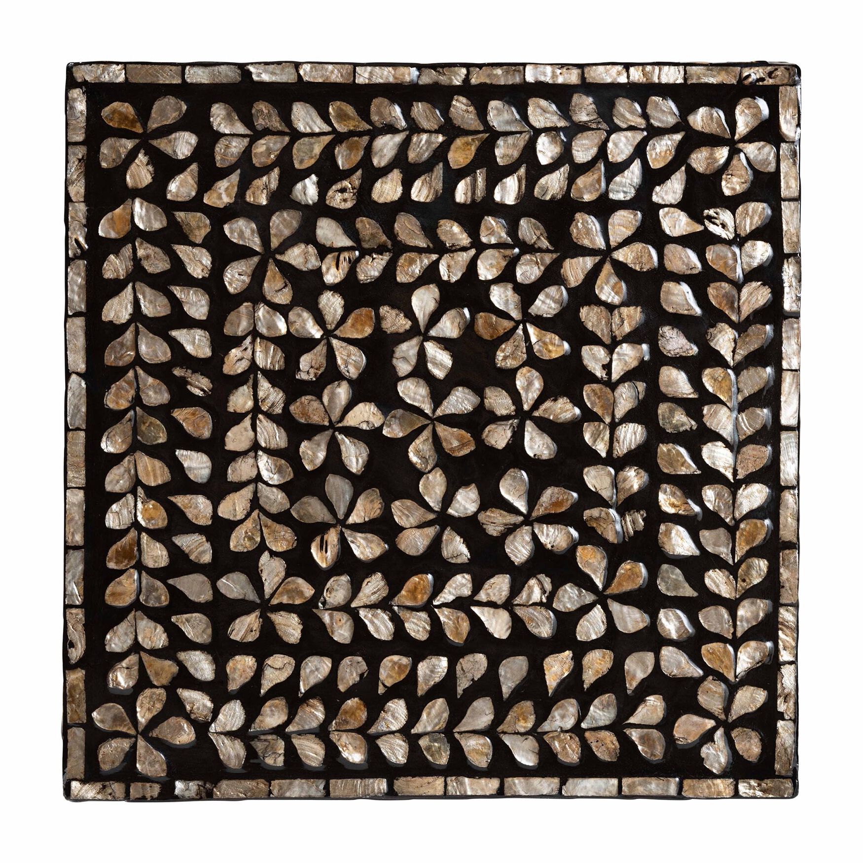 Top-down view of the mother of pearl inlay pattern on the end table.