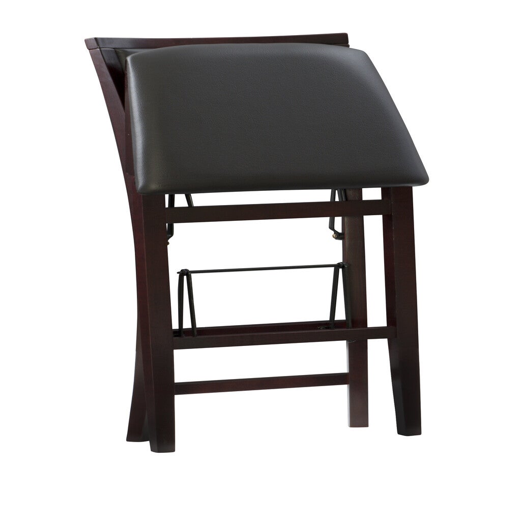 Close-up of the padded seat of a dark wood bar stool.