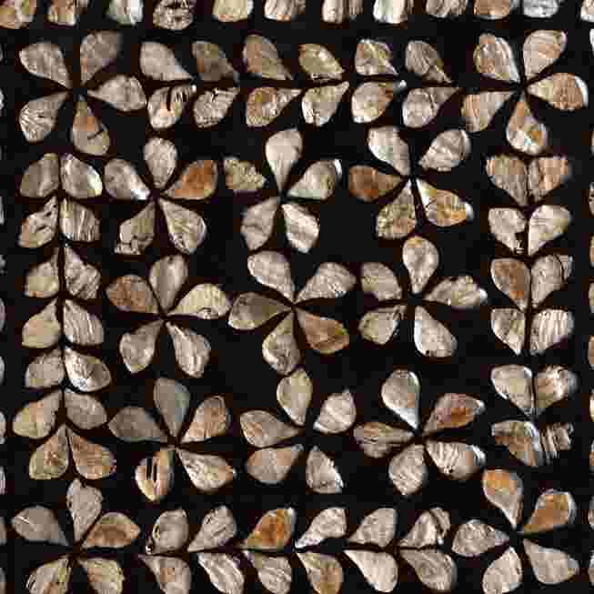 Close-up of the floral mother of pearl inlay pattern on the end table.