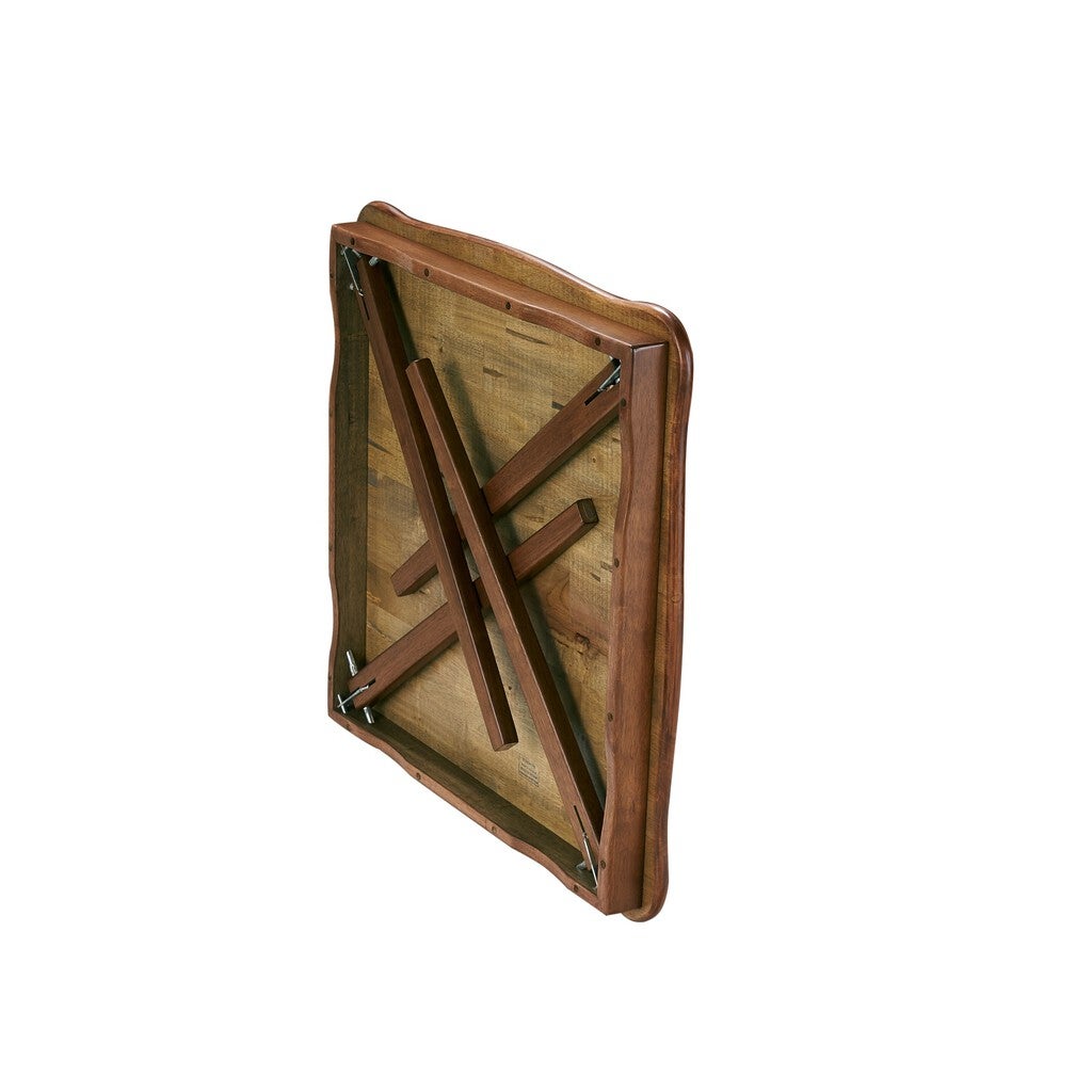 Underside of brown wooden table with support beams