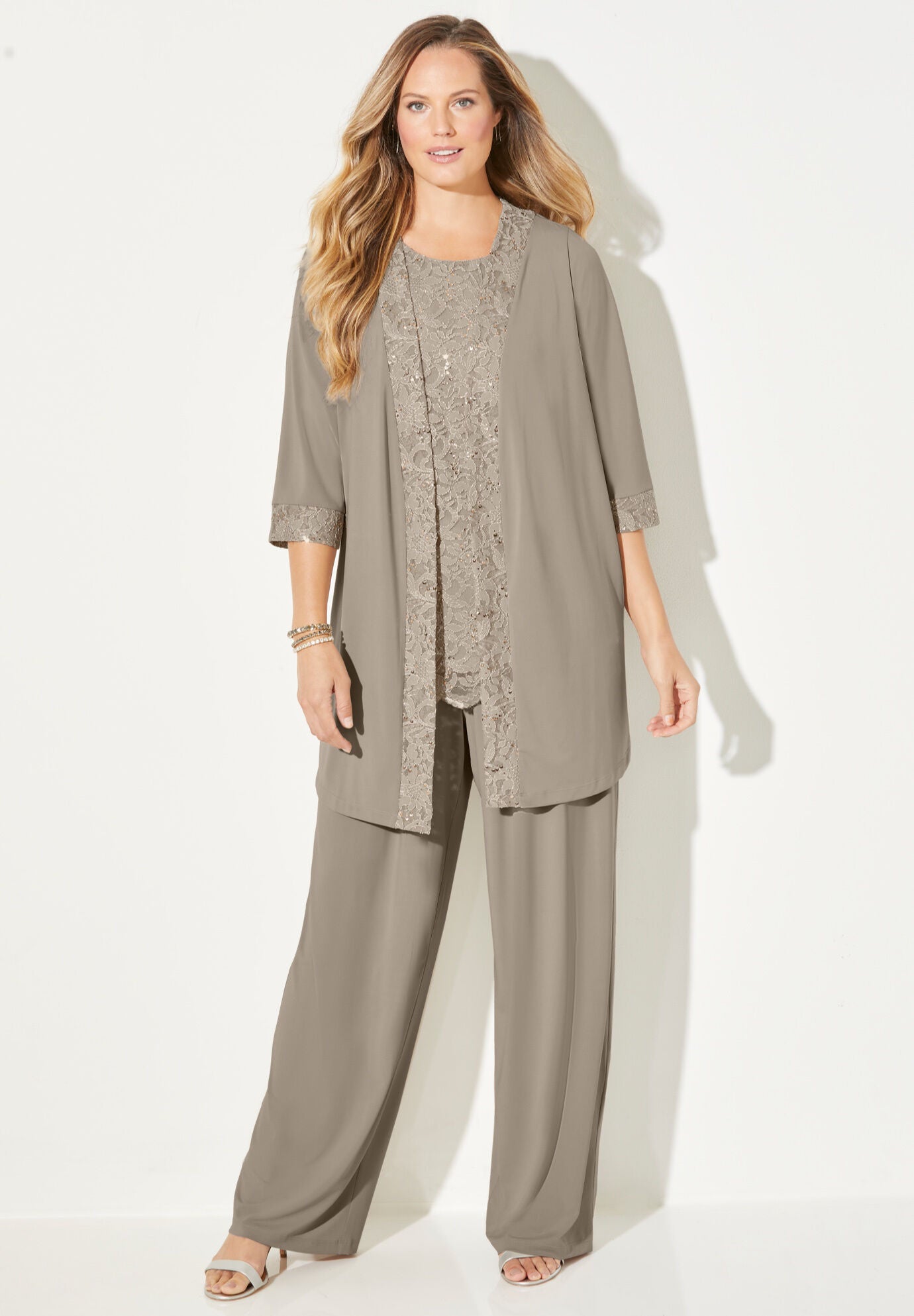 Woman within pant suits store