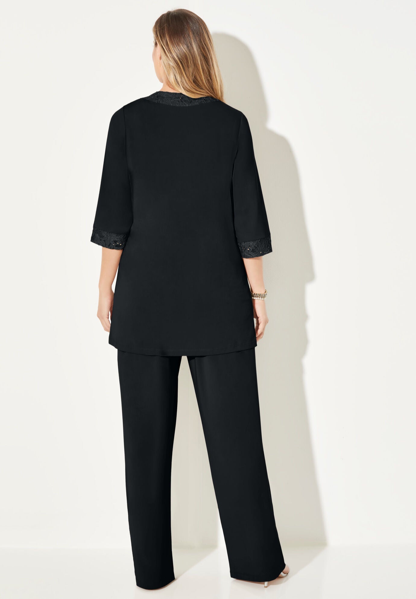 Woman within shop dressy pant suits