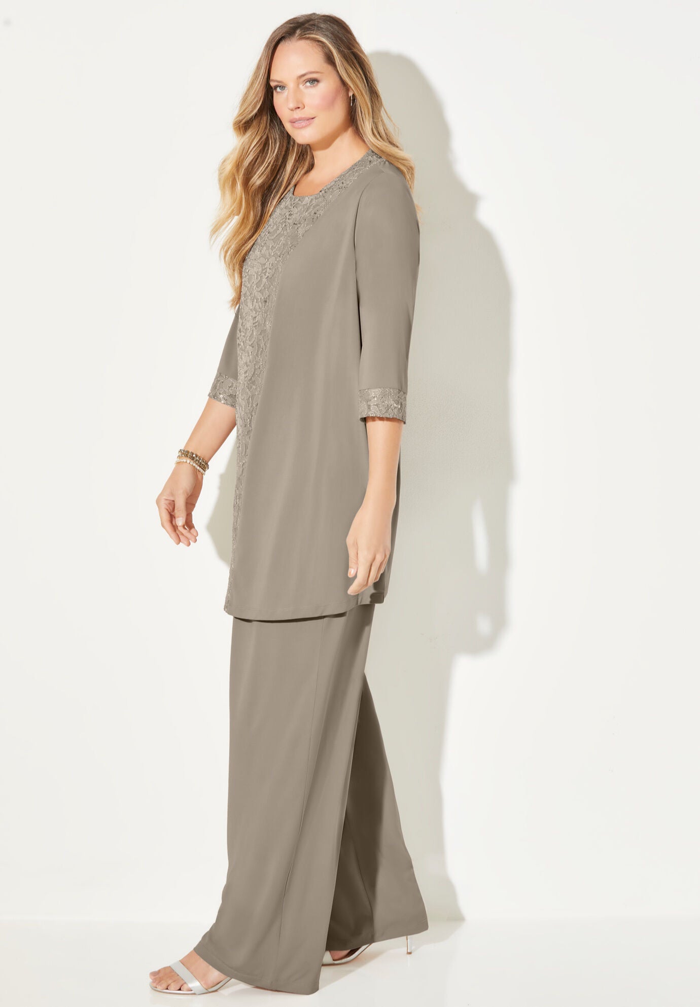 Woman within dressy pant suits top