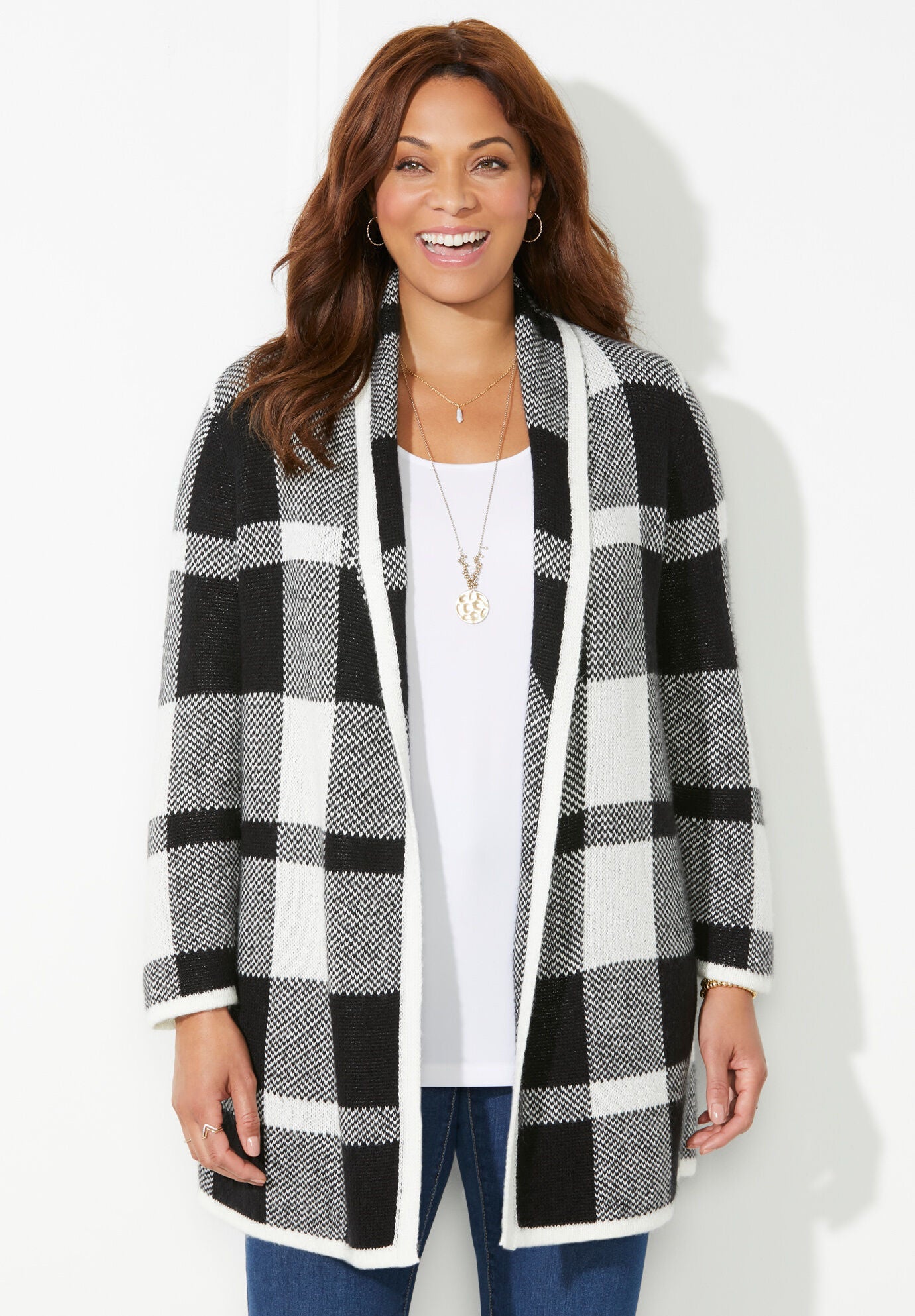 Woman within cardigan sweaters store