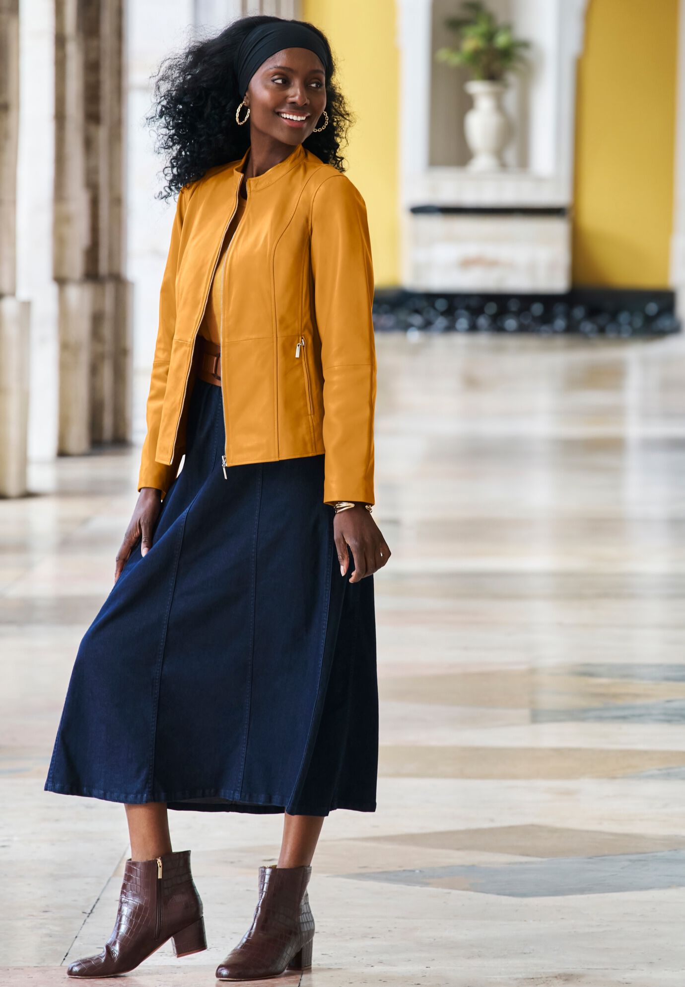 Woman within leather coats deals