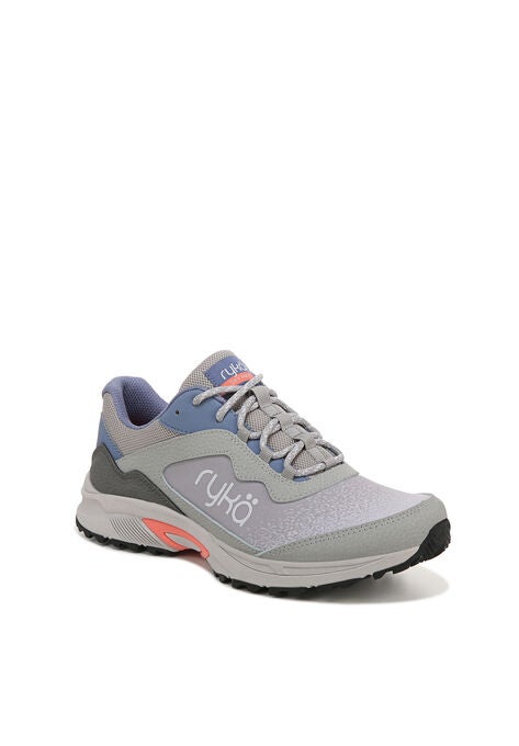 woman within tennis shoes
