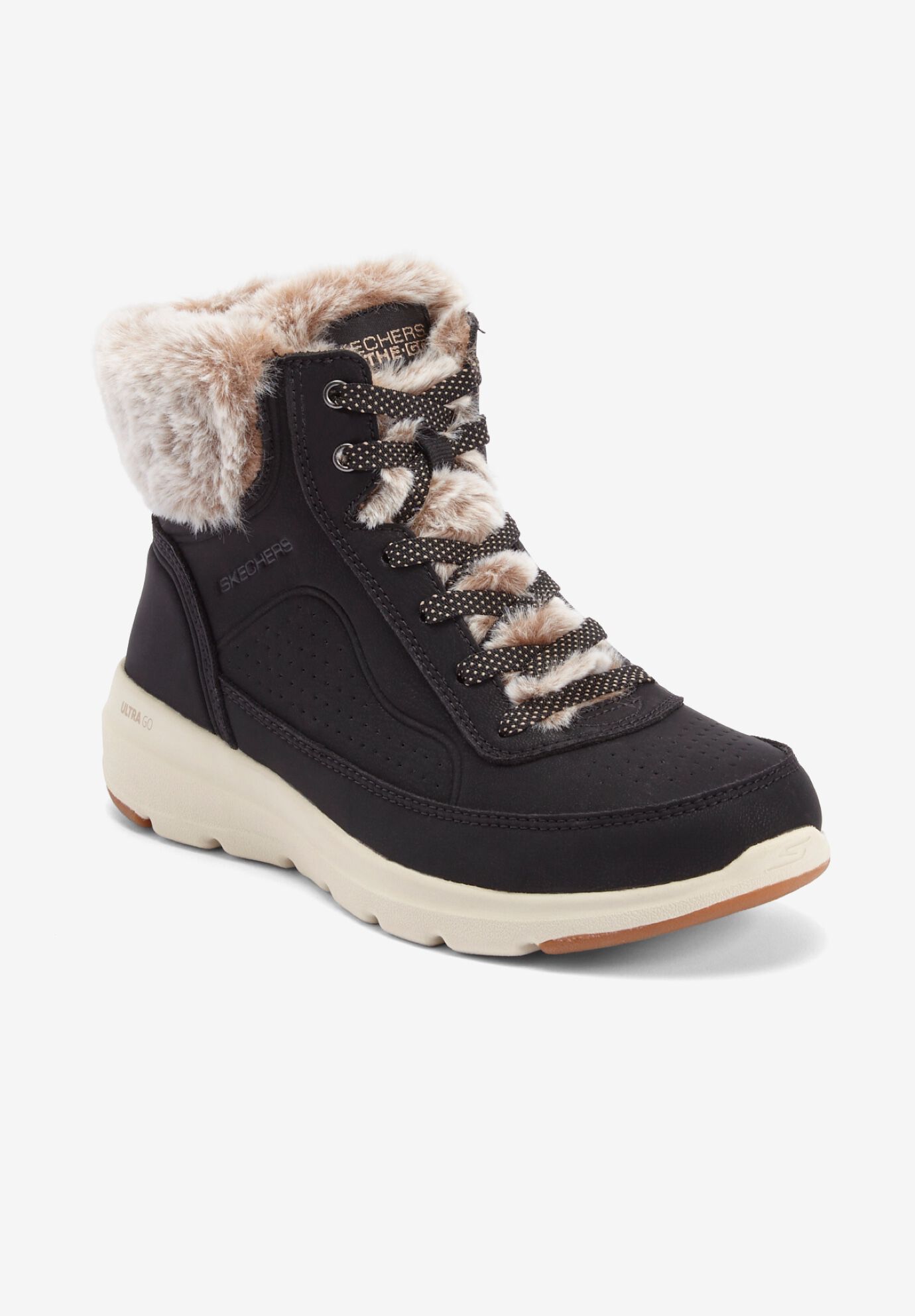 Woman within winter boots store