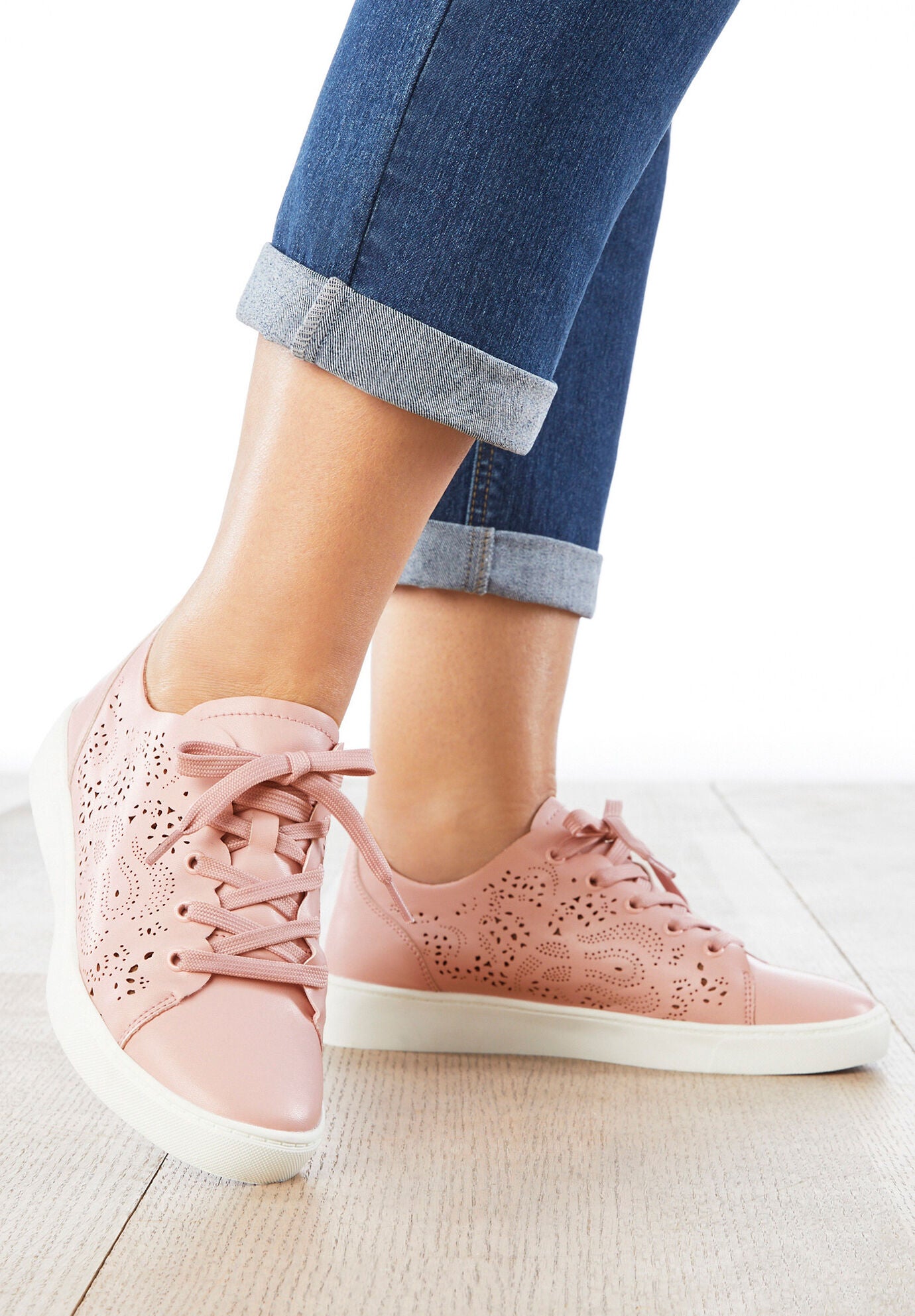 Woman within sneakers cheap