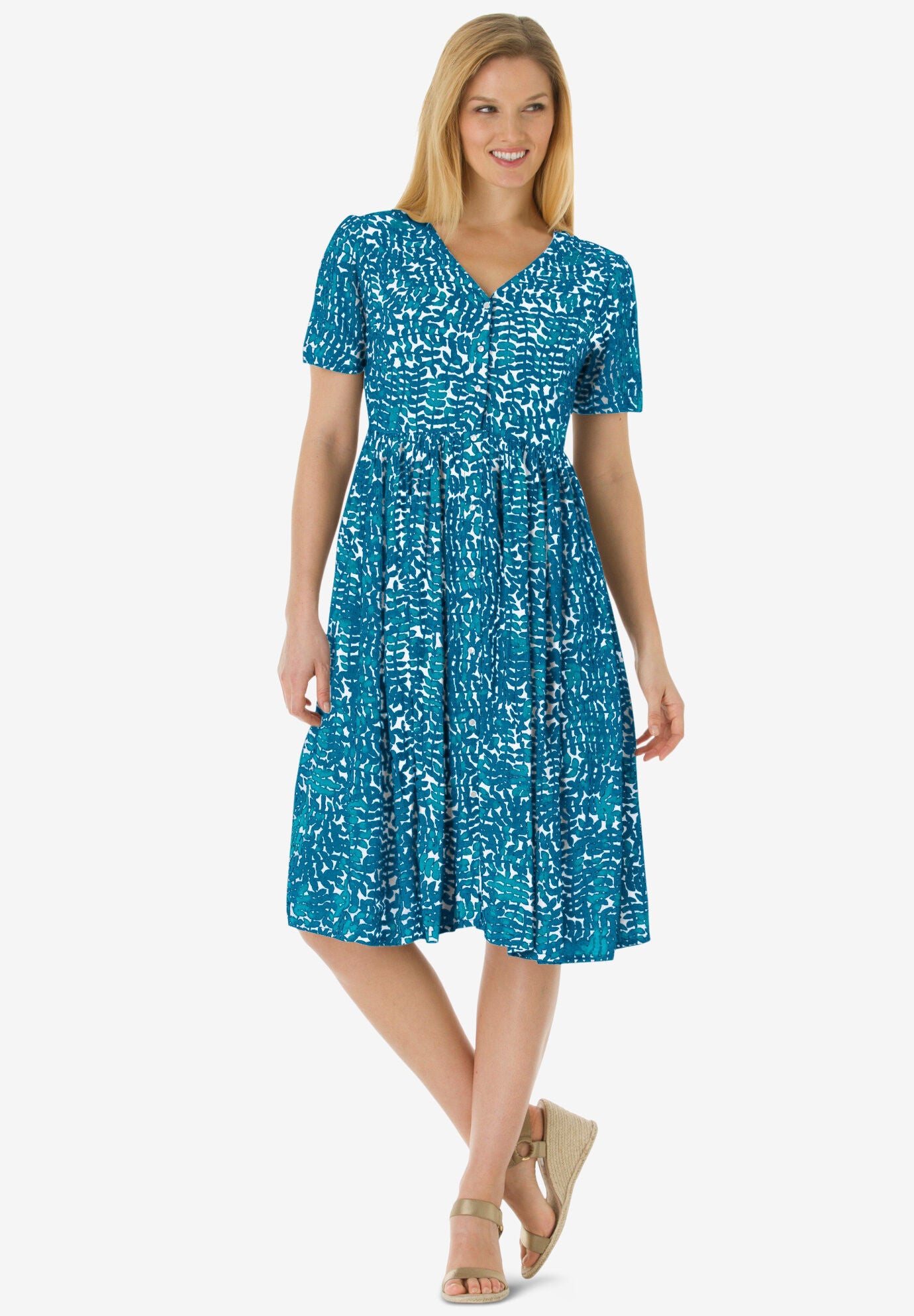 Woman within shop crinkle dress