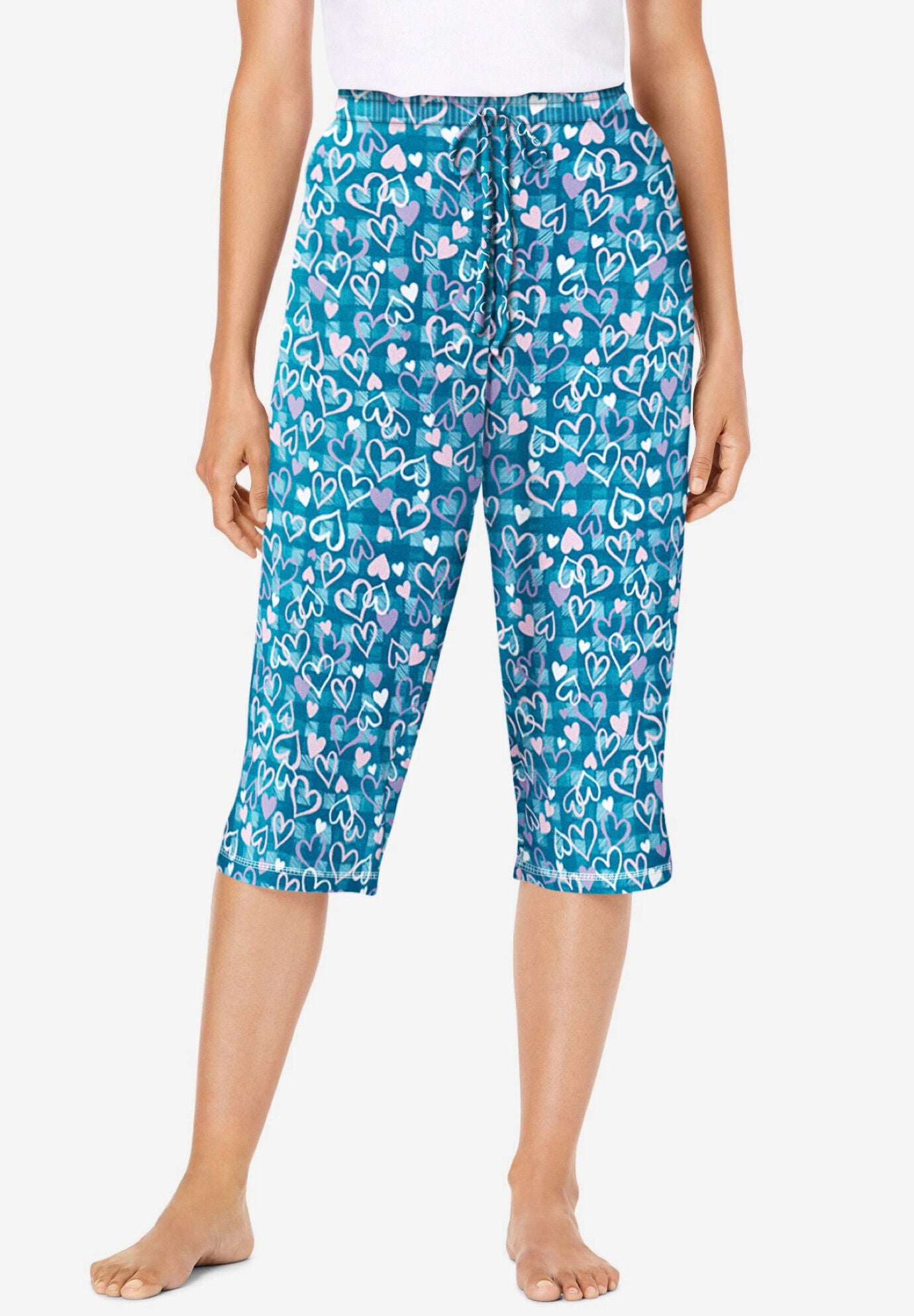 Woman within top capri pajamas