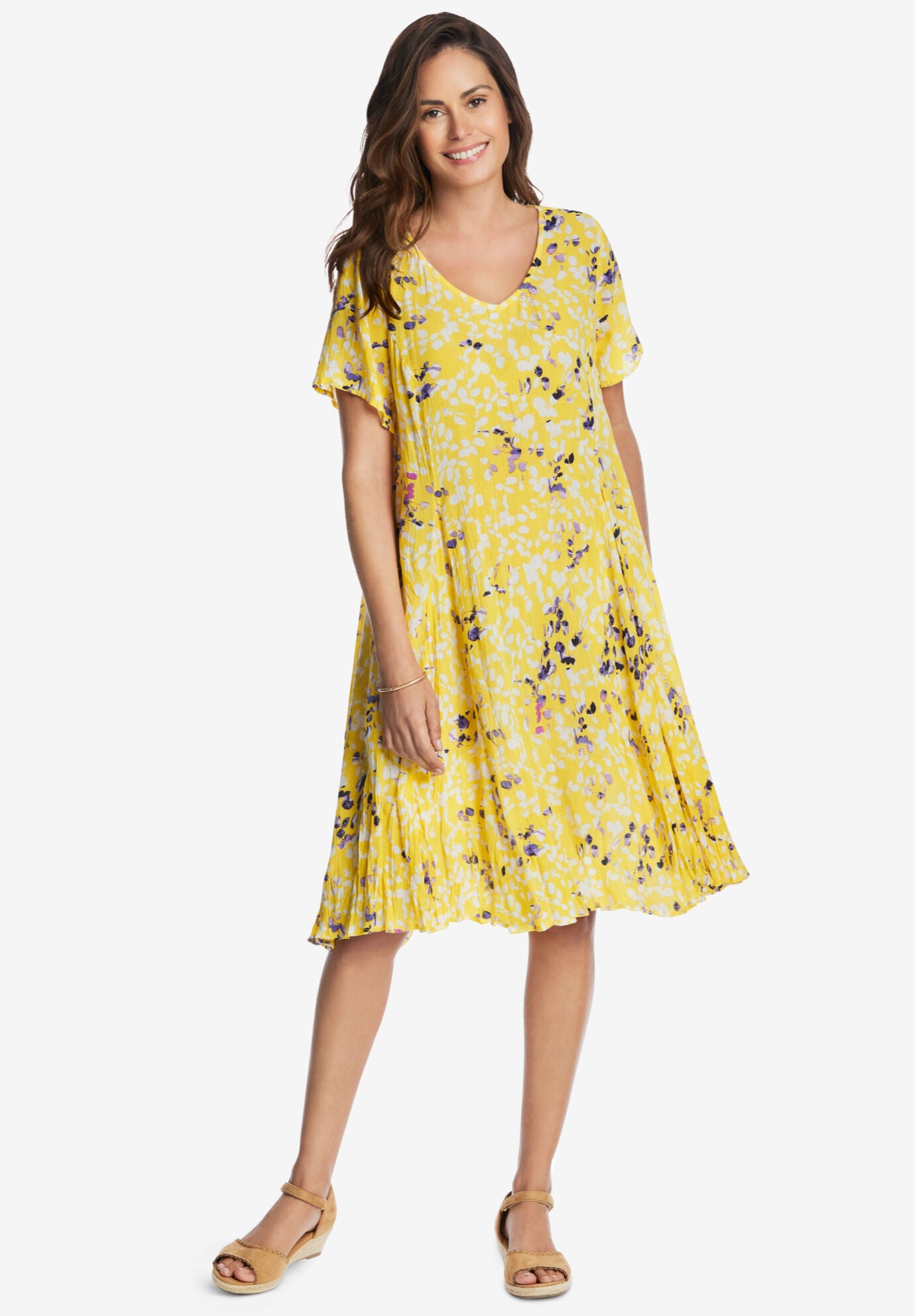 Woman within shop crinkle dress