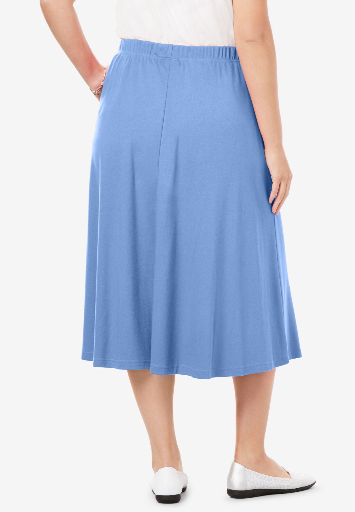 Woman within skirts clearance top