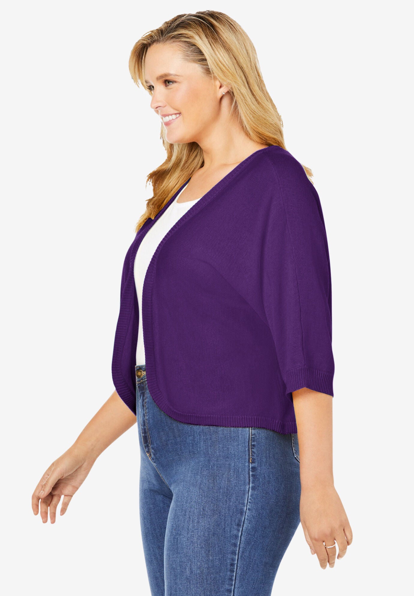Woman within outlet shrugs