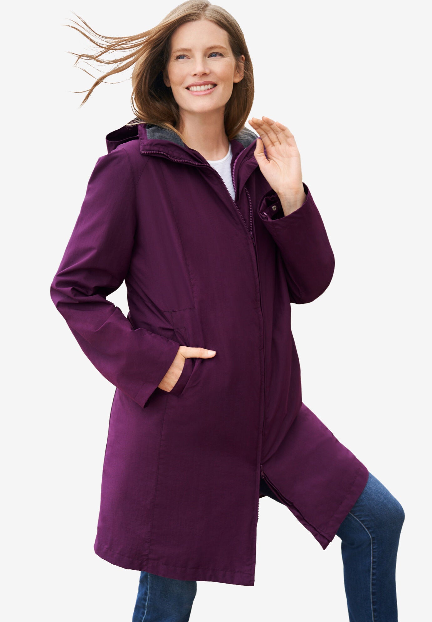 Woman within rain jackets store