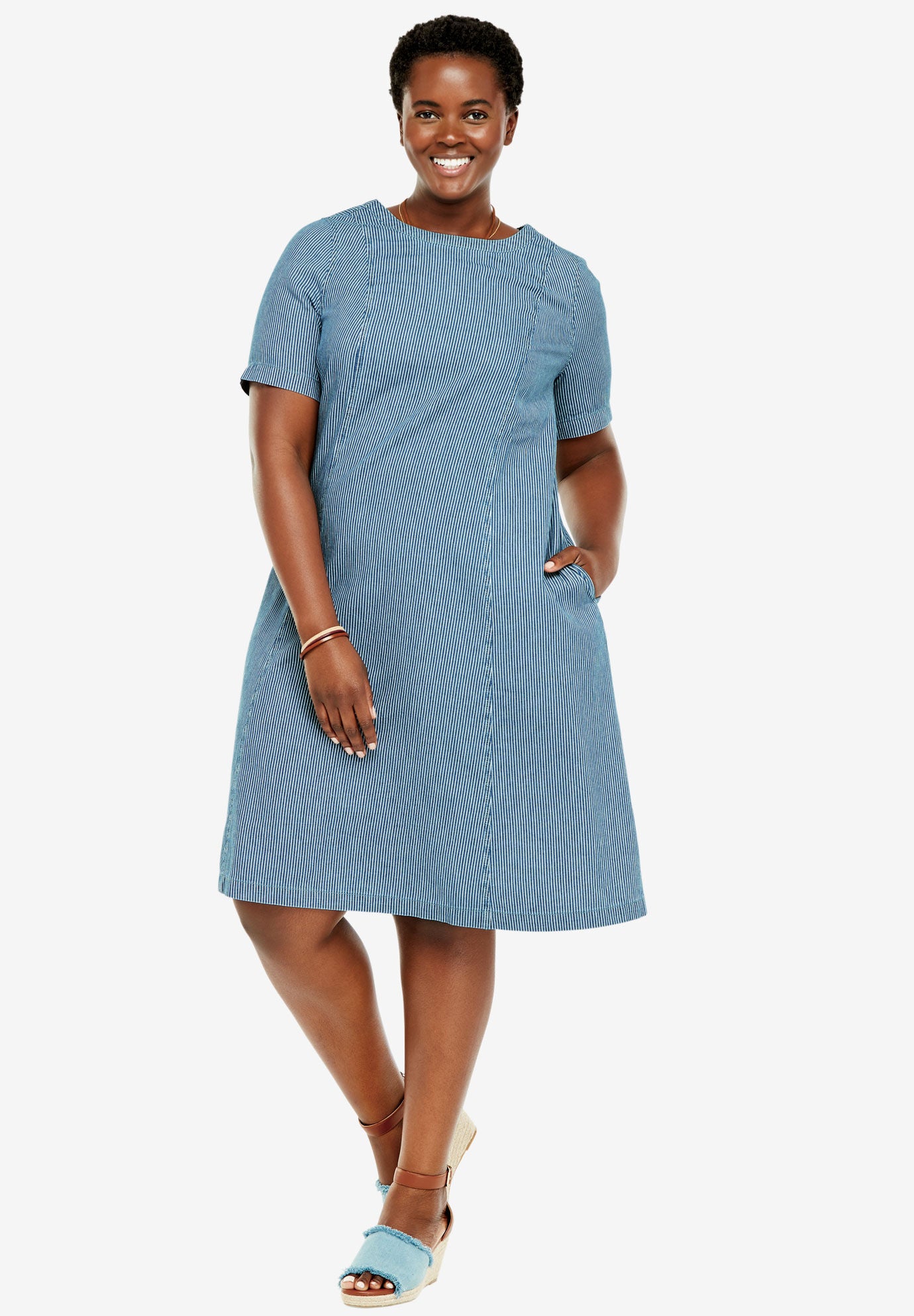 woman within denim dress