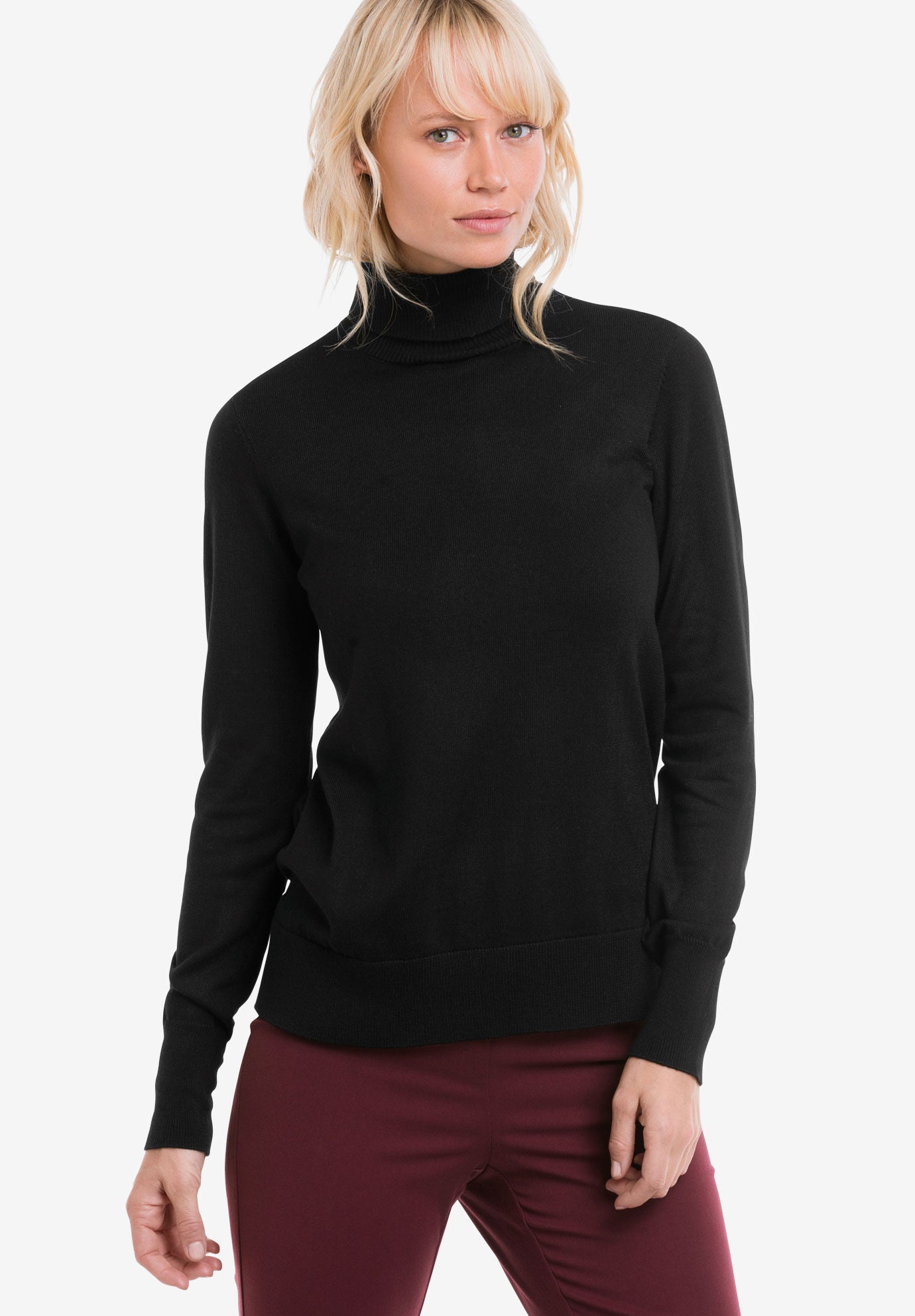 woman within turtleneck Cinosural International School