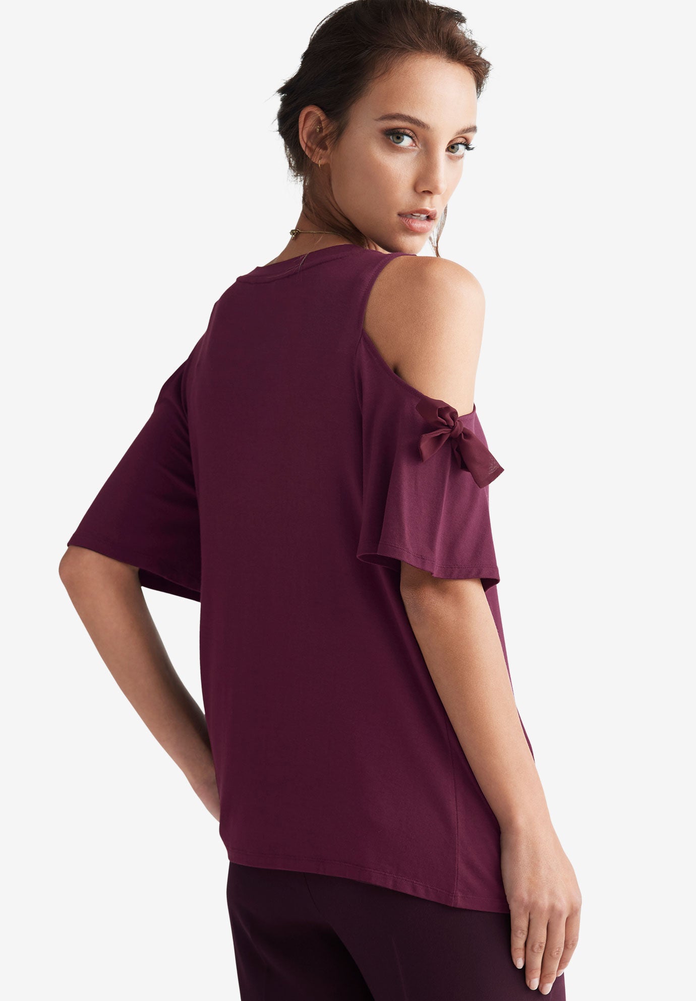 Woman within cold shop shoulder tops