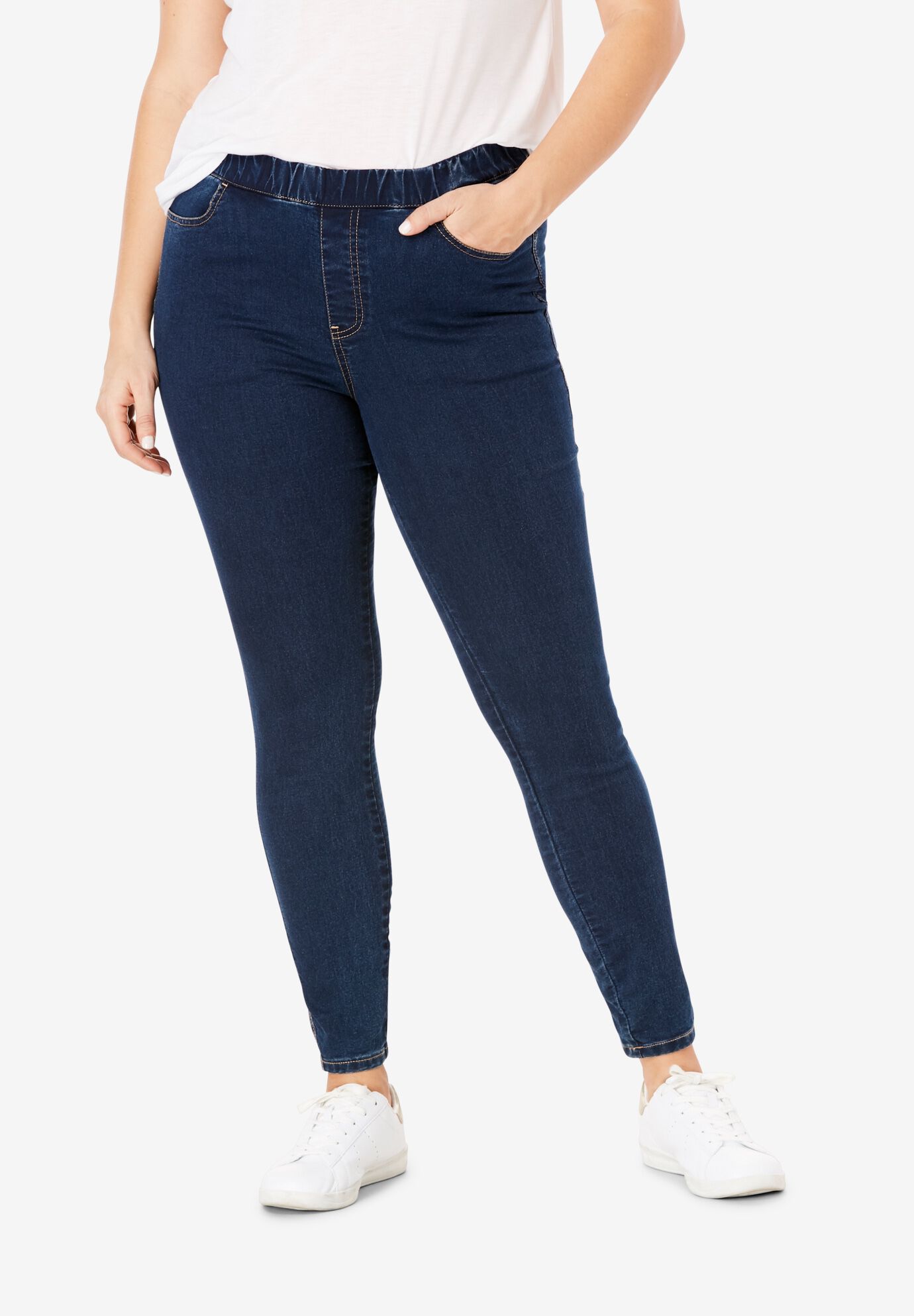 Woman within denim leggings