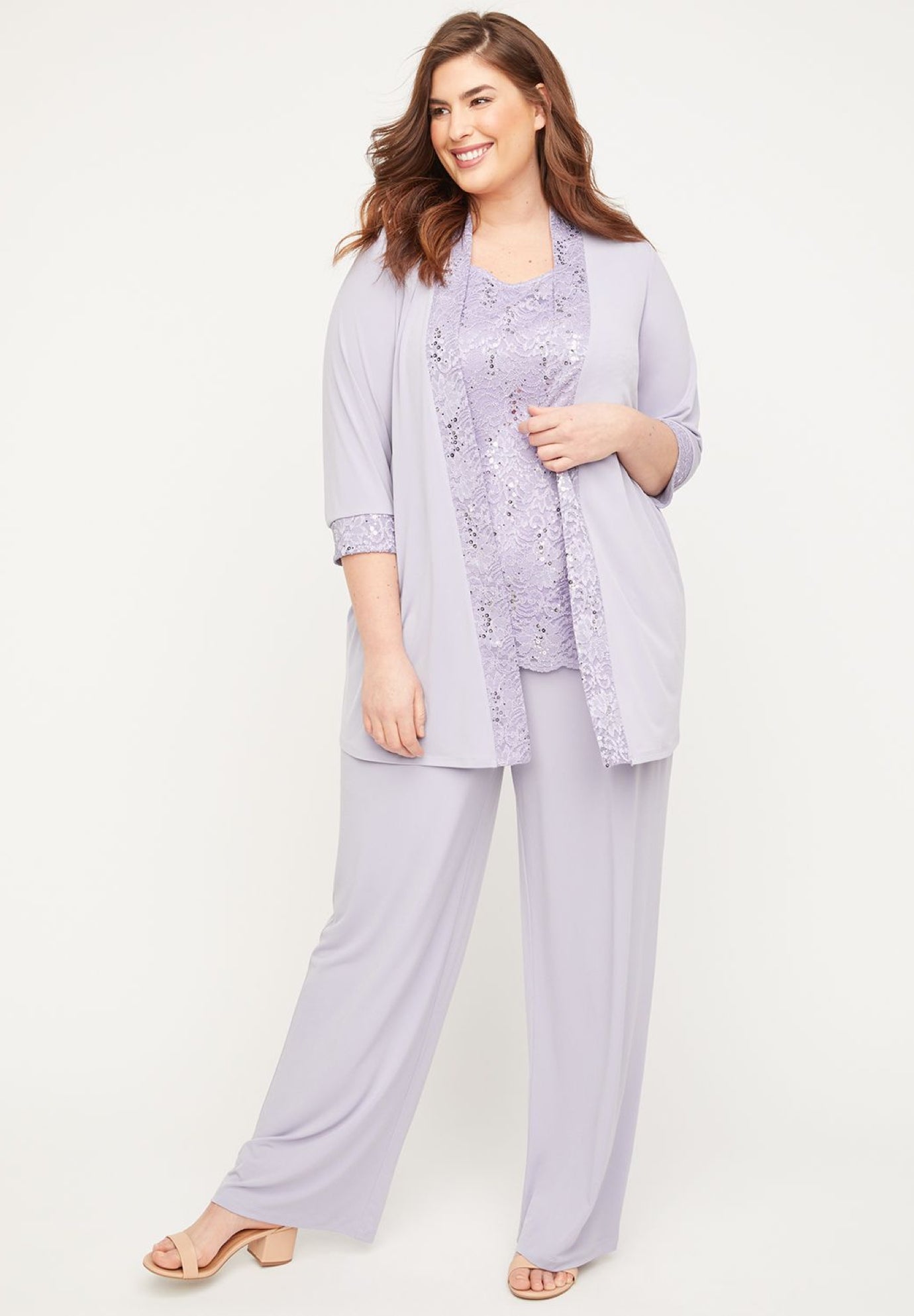 Woman within shop dressy pant suits
