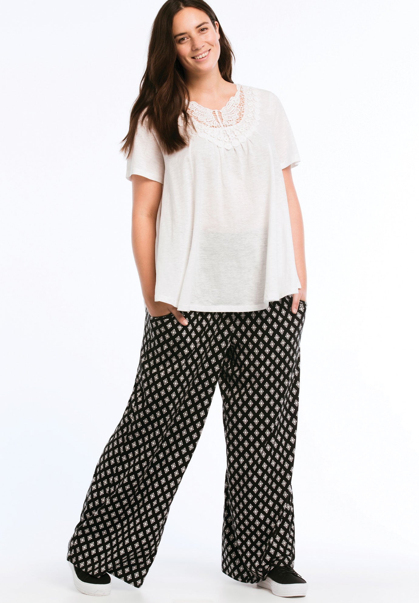 woman within white pants